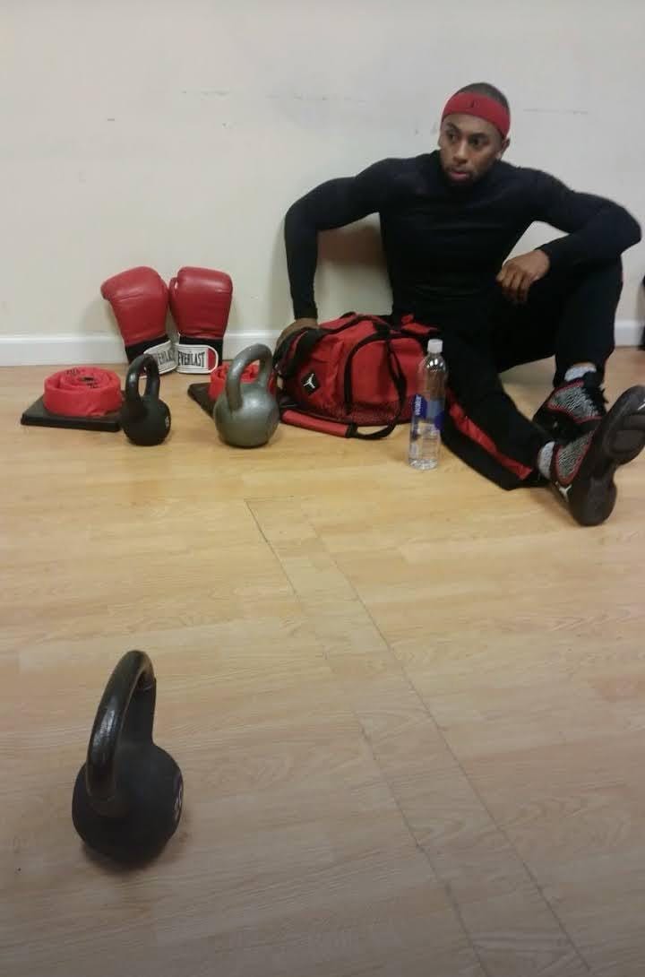Kettlebell, gloves and training kit laid out before a session